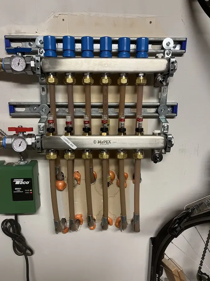 Plumber performing Water Heater Repair at a residential property in Mount Pleasant